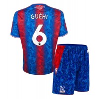 Maglia Calcio Crystal Palace Marc Guehi #6 Prima Divisa Bambino 2024-25 Manica Corta (+ pantaloncini)